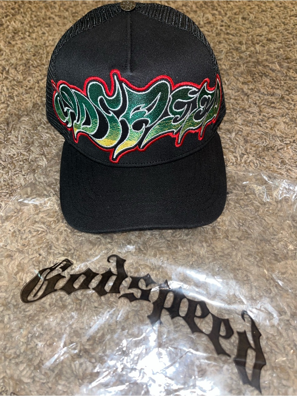 Godspeed Black Trucker Hat with Green & Red Flame Graphic